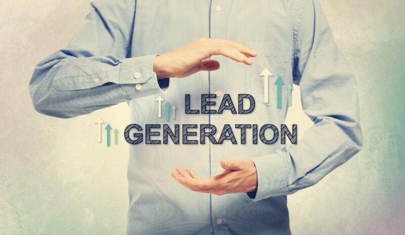 Adobe Stock royalty-free image #91080258, 'Young man in blue shirt holding Lead Generation' uploaded by Tierney, standard license purchased from https://stock.adobe.com/images/download/91080258; file retrieved on February 26th, 2019. License details available at https://stock.adobe.com/license-terms - image is licensed under the Adobe Stock Standard License