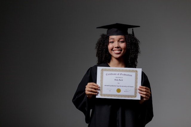Photo by Ron Lach : https://www.pexels.com/photo/woman-holding-a-diploma-9829306/